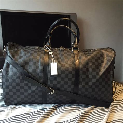 fake lv weekender bag|louis vuitton weekend bag women's.